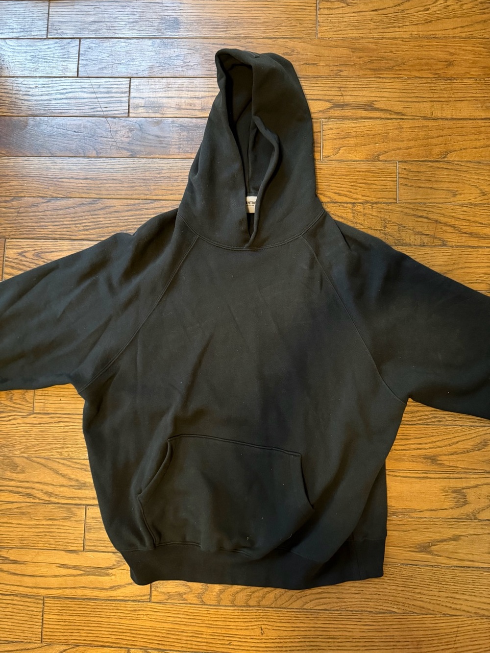 Fear of God Essentials Men's Black Hoodie with Logo Backprint